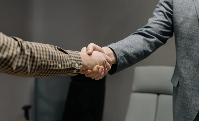 People shaking hands at job interview